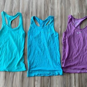 Bundle of Nike XS Racerback Tank Tops in Teal, Blue and Purple
